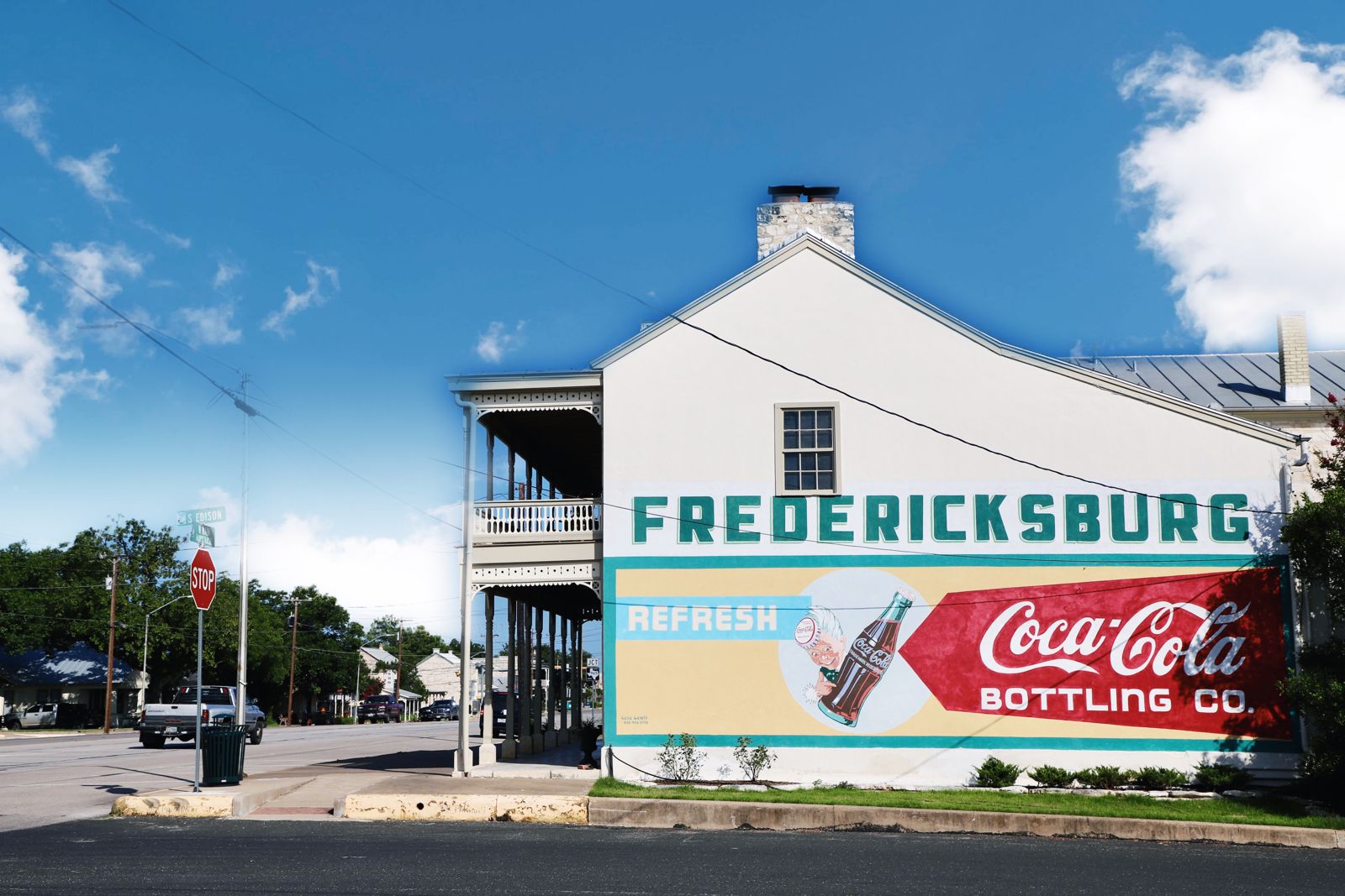 The historic Fredericksburg Coca-Cola mural on a white building downtown